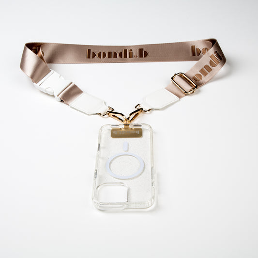 Stylish crossbody phone case with a nude colour adjustable strap, designed for convenience and hands-free use. Features a secure clear colour phone case holder and has a sleek design making it perfect for everyday minimalist wear.