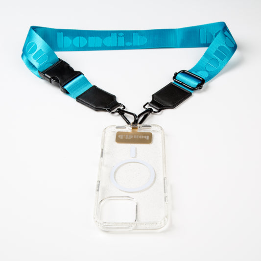 Stylish crossbody phone case with an aqua blue colour adjustable strap, designed for convenience and hands-free use. Features a secure clear colour phone case holder and has a sleek design making it perfect for everyday minimalist wear.