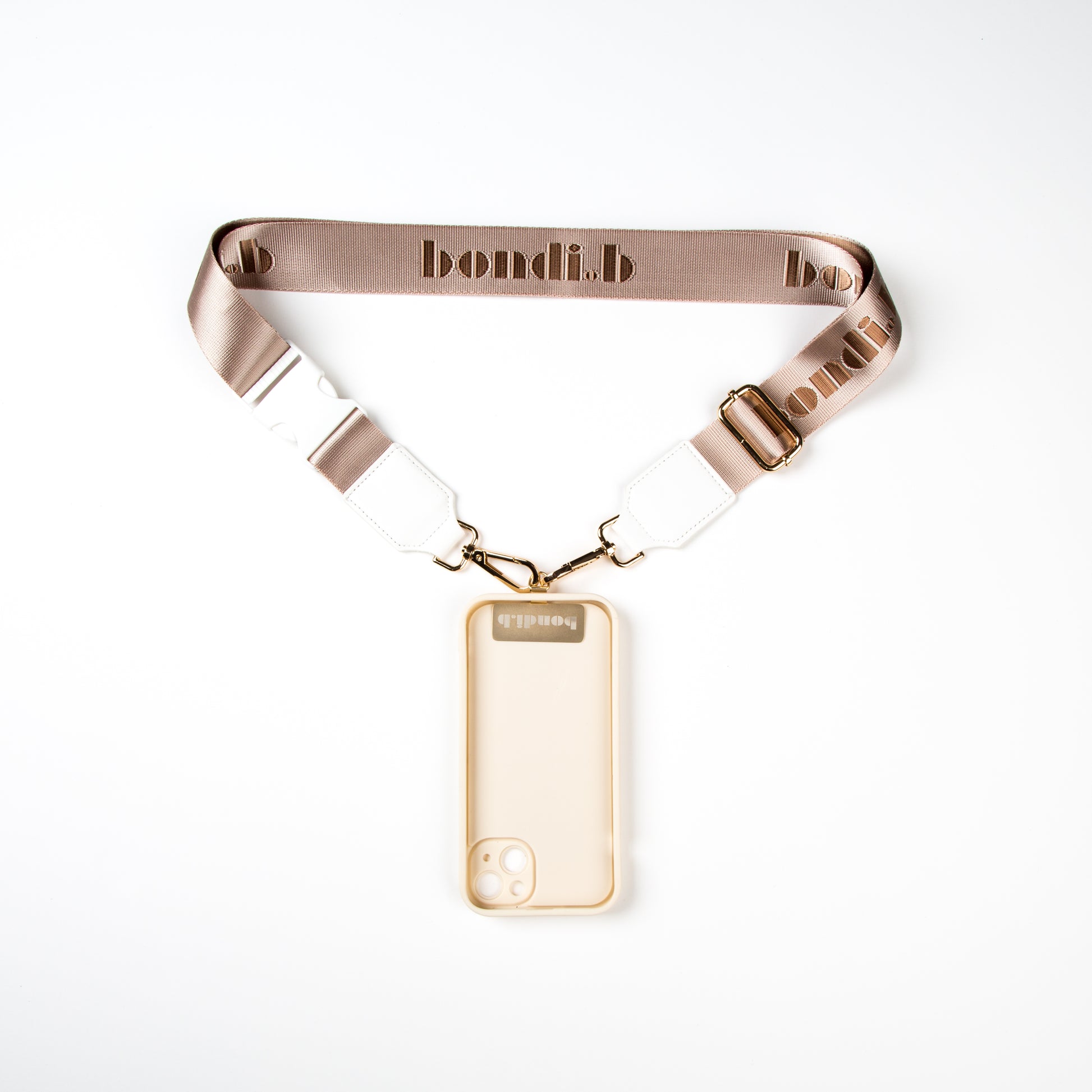 Stylish crossbody phone case with nude colour adjustable strap, designed for convenience and hands-free use. Features a secure cream colour phone case holder and has a sleek design making it perfect for everyday minimalist wear.