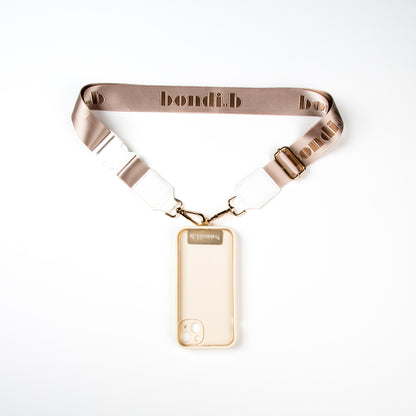 Stylish crossbody phone case with nude colour adjustable strap, designed for convenience and hands-free use. Features a secure cream colour phone case holder and has a sleek design making it perfect for everyday minimalist wear.
