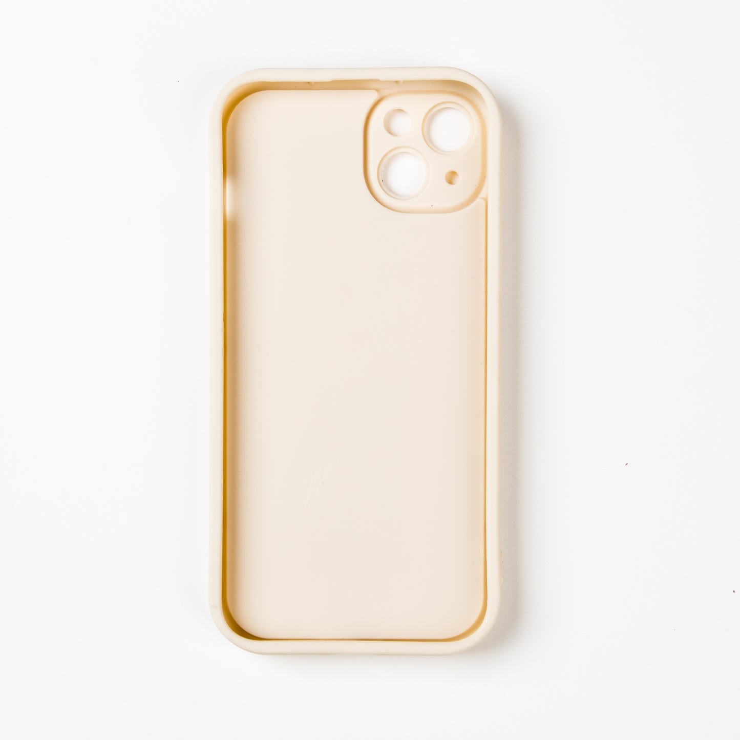 Stylish crossbody phone case with nude colour adjustable strap, designed for convenience and hands-free use. Features a secure cream colour phone case holder and has a sleek design making it perfect for everyday minimalist wear.