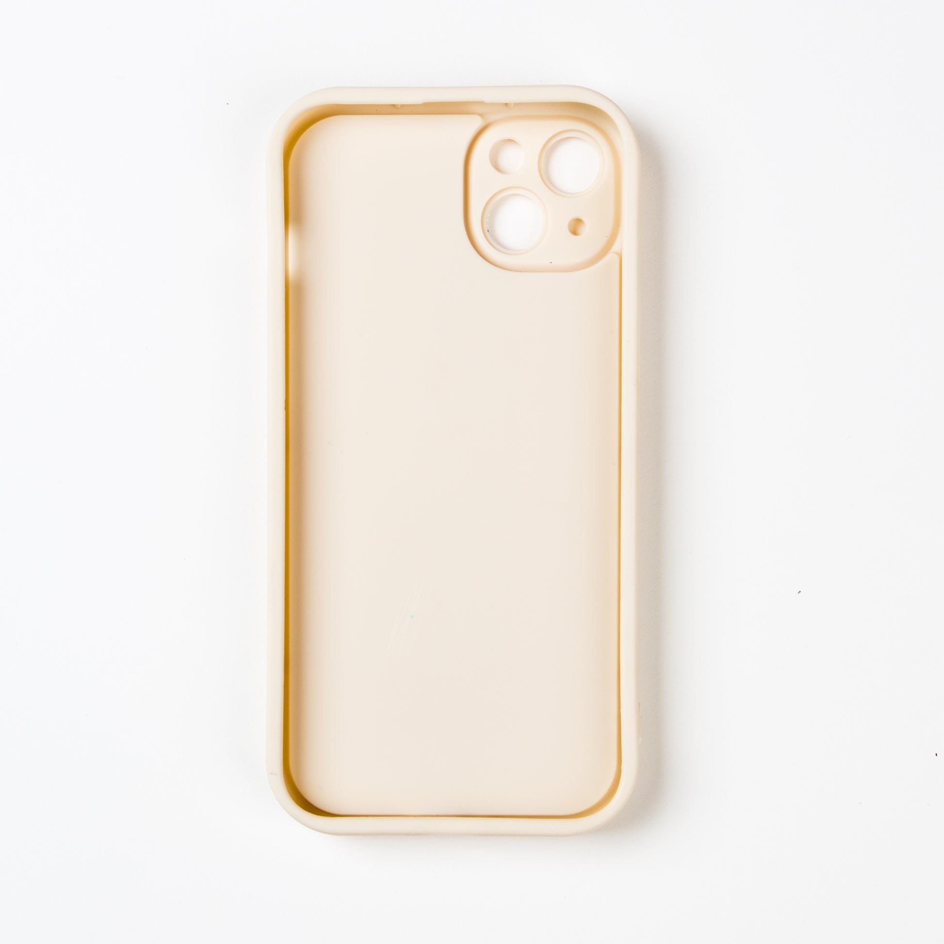 Stylish crossbody phone case with nude colour adjustable strap, designed for convenience and hands-free use. Features a secure cream colour phone case holder and has a sleek design making it perfect for everyday minimalist wear.