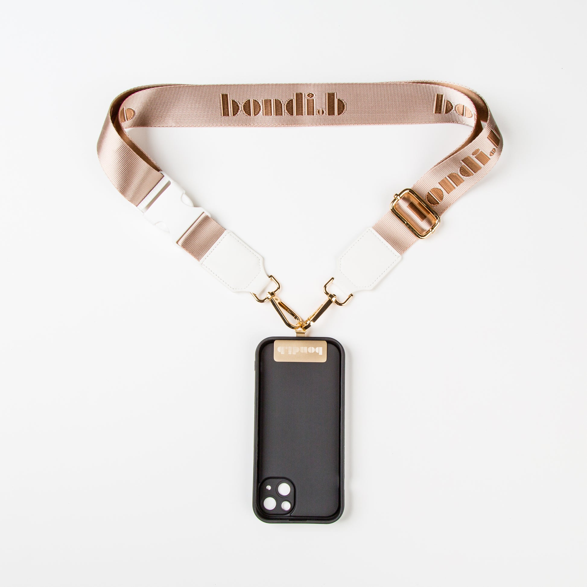 Stylish crossbody phone case with nude colour adjustable strap, designed for convenience and hands-free use. Features a secure black colour phone case holder and has a sleek design making it perfect for everyday minimalist wear.