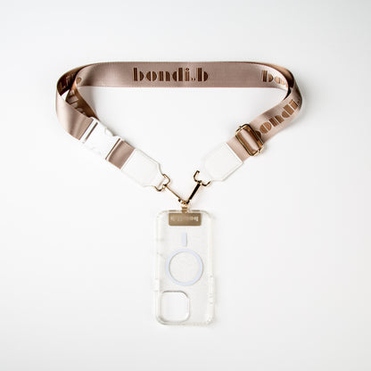 Stylish crossbody phone case with a nude colour adjustable strap, designed for convenience and hands-free use. Features a secure clear colour phone case holder and has a sleek design making it perfect for everyday minimalist wear.